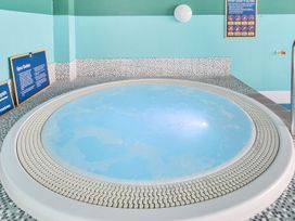 A hot tub in a spa area at Windsurfer’s Rest - Hayling Island Holiday Park