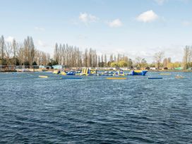 An inflatable obstacle course in water at Waterslide Way - Billing Aquadrome