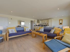 A living room with sofas and a coffee table at Apartment 12, Burgh Island Causeway Bigbury-On-Sea
