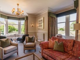 A living room with a sofa and armchairs at Leathes Head Country House in Borrowdale near Keswick