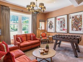 A snug with a foosball table and seating at Leathes Head Country House in Borrowdale near Keswick