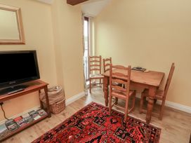 A dining room with a table and chairs at The Hayloft near Wigton