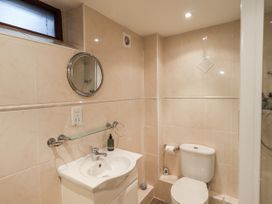 A bathroom with sink and toilet at The Coach House near Wigton
