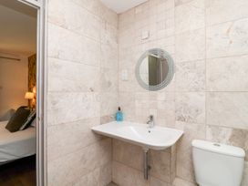 A bathroom with a sink and toilet at Valley Lodge 37, St Ann's Chapel, Cornwall