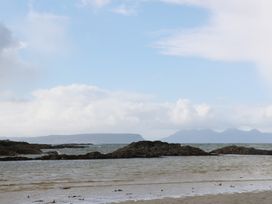 A view of the sea and rocks at Island View Lodge Back of Keppoch near Arisaig