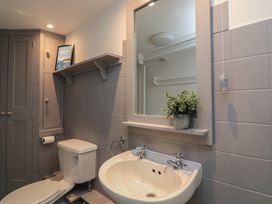A bathroom with a sink and toilet at 43 The Salcombe in Salcombe