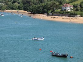 A view of boats on the water near a beach at 43 The Salcombe Salcombe