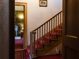 A staircase in a hallway at Cheviot Manor in Akeld near Wooler