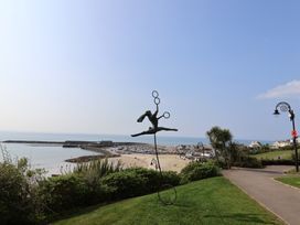 A sculpture near the beach with ocean views at Flat 2 The Cedars Lyme Regis