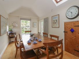 A dining room with a table and chairs at Ty Clyd in Newport, Pembrokeshire