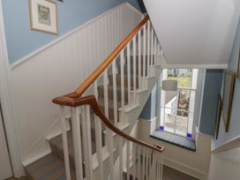A staircase leading to an upper floor at Ty Clyd Newport, Pembrokeshire