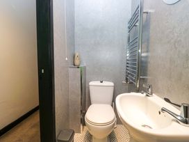 A bathroom with a toilet and sink at Havelock Hideaway Windermere