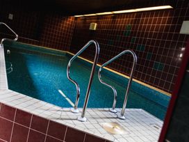 An indoor pool with railings at Timberwick Green Akeld near Wooler