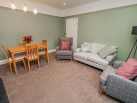 A living room with a dining area at 3 Lisburn Street Alnwick