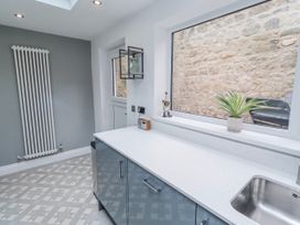 A kitchen with a sink and countertop at 3 Lisburn Street in Alnwick