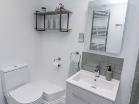 A bathroom with a toilet and sink at 3 Lisburn Street Alnwick