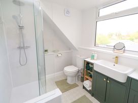 A bathroom with a shower and sink at The Lodge in Powburn
