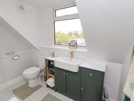 A bathroom with a sink and toilet at The Lodge in Powburn