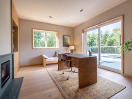 An office with a desk and a chair at Deer Close in Coniston