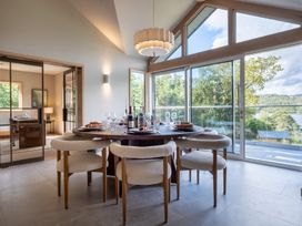 A dining room with a table and chairs at Deer Close in Coniston