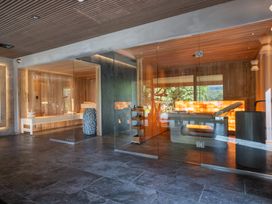 A spa area with sauna and treatment table at Deer Close in Coniston