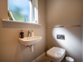 A bathroom featuring a sink and toilet at Deer Close in Coniston