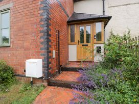 An entrance with a pathway and plants at 2 Loxter Villas Wellington Heath near Ledbury