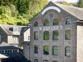 A building with the name Warfleet on the facade at Mariners Retreat, 8 Pottery Cottages, Dartmouth