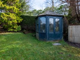 A gazebo in a garden at Marina View in Bowness-On-Windermere