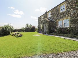 A stone house with garden and pathway at High Wood Foot, Bampton, Cumbria