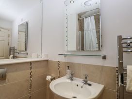 A bathroom with a sink and mirror at 6 Burgh Island Bigbury-On-Sea