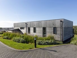 A modern building with landscaping at Dahlia in Portreath