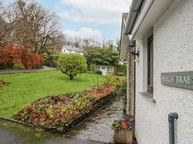 An outdoor view with garden and pathway at Beech Brae in Kendal