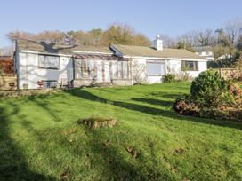 A house with a garden and patio at Beech Brae in Kendal