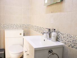 A bathroom with a sink and toilet at 2 The Elms Salcombe