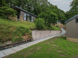 An outdoor area with houses and a pathway at Elter Luxury Pod Keswick