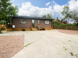 A house with steps and potted plants at Dunromin Montgomery