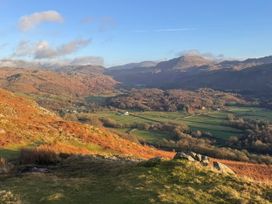 A landscape view of mountains and fields at Dakota near Boot