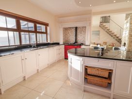 A kitchen with counter space and windows at Ard Na Mara in Drung near Quigley's Point, County Donegal