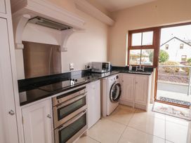 A kitchen with appliances and a countertop at Ard Na Mara Drung near Quigley's Point, County Donegal