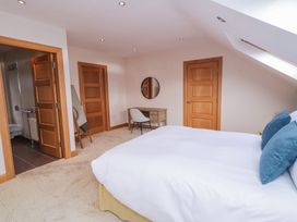 A bedroom with a bed and desk at Ard Na Mara Drung near Quigley's Point County Donegal