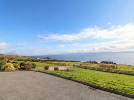 A view of grass and sea from Ard Na Mara in Drung near Quigley's Point, County Donegal