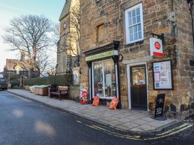 A village store with a post office sign in Alnmouth