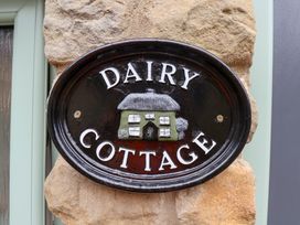 A sign that reads Dairy Cottage