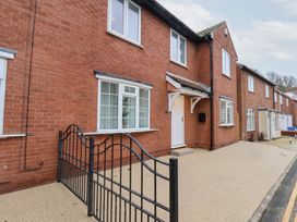 A house exterior with a gate and windows at 32 Quay Street Scarborough