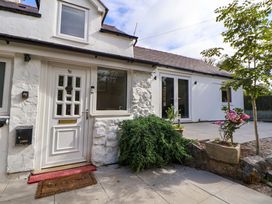 The entrance of a property with a front door and garden area at Cartref Pen Y Ball near Holywell