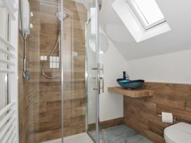 A bathroom with a shower and toilet at Kernyk in Camelford