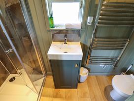 A bathroom with a sink and shower at Bluebell in Grimsby