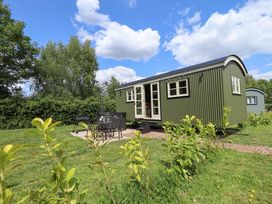 A cabin with outdoor seating area at Primrose in Grimsby