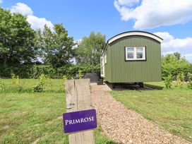 A shepherd's hut with a sign at Primrose in Grimsby